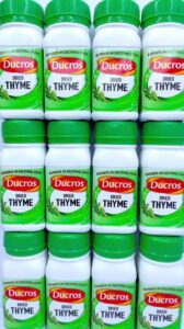 Retail glass jar of Ducros Thyme containing dried thyme leaves. Packaged herb seasoning for culinary use, suitable for retail sale and export.